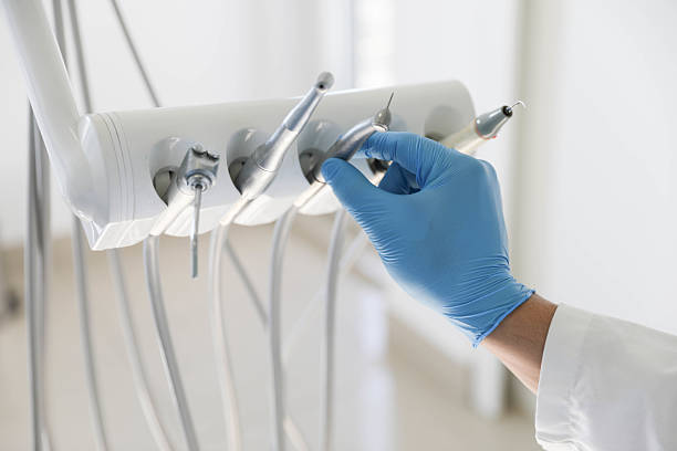 Professional Tooth Extraction technician working in Mooresville, NC